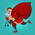 Santa Claus disabled on prostheses delivers gifts for Christmas Royalty Free Stock Photo