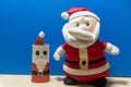 Santa Claus doll on blue background