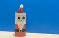 Santa Claus doll on blue background