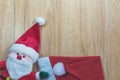 Santa Claus doll with Santa Claus red hat in Christmas day Royalty Free Stock Photo