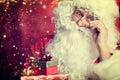 Santa Claus drinking tea Closeup Portrait Isolated on red Royalty Free Stock Photo