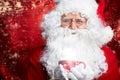 Santa Claus drinking tea Closeup Portrait Isolated on red Royalty Free Stock Photo