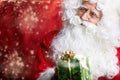 Santa Claus drinking tea Closeup Portrait Isolated on red Royalty Free Stock Photo