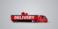 Santa claus driving delivery semi truck with gift box container shipping transport for merry christmas happy new year Royalty Free Stock Photo