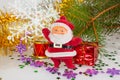 Santa claus with a drum and a gift Royalty Free Stock Photo