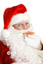 Santa Claus Eating Christmas Cookie Royalty Free Stock Photo
