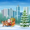 Santa claus and elf riding his sleigh at winter cityscape Royalty Free Stock Photo