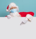 Santa Claus in face masks during Covid-2019 Royalty Free Stock Photo