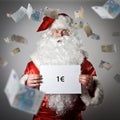 Santa Claus and falling Euro banknotes. Royalty Free Stock Photo