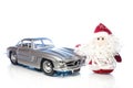 Santa Claus or Father Frost with old retro car Royalty Free Stock Photo