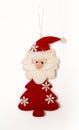 Santa Claus from felt, Christmas tree decoration isolated on white. Royalty Free Stock Photo