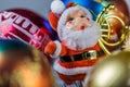 Santa Claus Figurine And Christmas Baubles Royalty Free Stock Photo