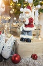 Santa claus figurine at christmas tree Royalty Free Stock Photo