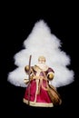 Santa Claus figurine white christmas tree on black background