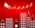 Santa Claus flying over the city Royalty Free Stock Photo