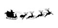 Santa Claus flying in a sleigh with reindeer, black vector silhouette on a white background. Christmas flat illustration Royalty Free Stock Photo