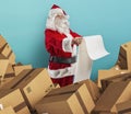 Santa Claus is full of presents request and boxes to delivery Royalty Free Stock Photo