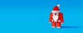 Santa Claus funny 3d character with red nose. Christmas Holidays concept on blue background 3d render Royalty Free Stock Photo