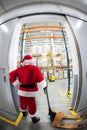 Santa Claus & the gate to gift distribution center Royalty Free Stock Photo