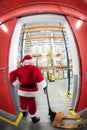 Santa Claus & the gate to gift distribution center Royalty Free Stock Photo