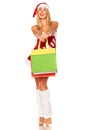 Santa Claus girl with purchases Royalty Free Stock Photo