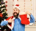 Santa Claus with happy face near Christmas tree Royalty Free Stock Photo