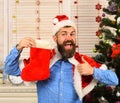 Santa Claus with happy face near Christmas tree Royalty Free Stock Photo