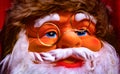 Santa Claus has glasses crooked over his nose