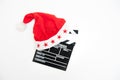 Santa Claus hat on a movie clapper board Royalty Free Stock Photo