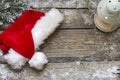 Santa Claus hat on vintage wooden boards christmas background Royalty Free Stock Photo