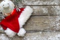 Santa Claus hat on vintage wooden boards christmas background Royalty Free Stock Photo