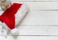 Santa Claus hat on white wooden boards Royalty Free Stock Photo