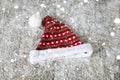 The Santa Claus hat on a wooden background in the snow Royalty Free Stock Photo