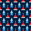 Santa Claus hats and christmas trees icon seamless pattern. Vector design in geometric style. Festive Christmas Royalty Free Stock Photo