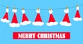 Santa claus hats on clothesline Royalty Free Stock Photo
