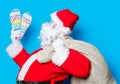 Santa Claus have holding flip flops Royalty Free Stock Photo