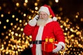 Santa Claus having Christmas call.