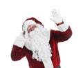 Santa Claus with headphones listening to Christmas music on white background Royalty Free Stock Photo