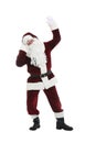 Santa Claus with headphones listening to Christmas music on white background Royalty Free Stock Photo