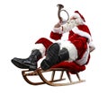 Santa Claus on his sleigh with a sack with presents. Winter snowy day with white snow. Royalty Free Stock Photo
