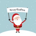 santa claus hold banner sign showing christmas text greeting winter landscape background Royalty Free Stock Photo