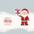 Santa claus hold gift winter snowy background