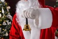 Santa Claus holding Christmas bell in his hand Royalty Free Stock Photo