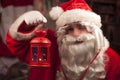 Santa Claus holding Christmas lantern Royalty Free Stock Photo