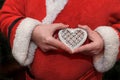 Santa Claus holding a heart Royalty Free Stock Photo