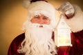 Santa Claus holding magic lantern