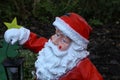 Santa Claus holds a lantern in his hand Royalty Free Stock Photo