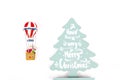 Santa Claus in Hot air balloon flight up to a wood green tree, on white background Royalty Free Stock Photo