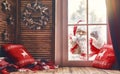 Santa Claus is knocking at window Royalty Free Stock Photo