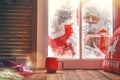 Santa Claus is knocking at window Royalty Free Stock Photo